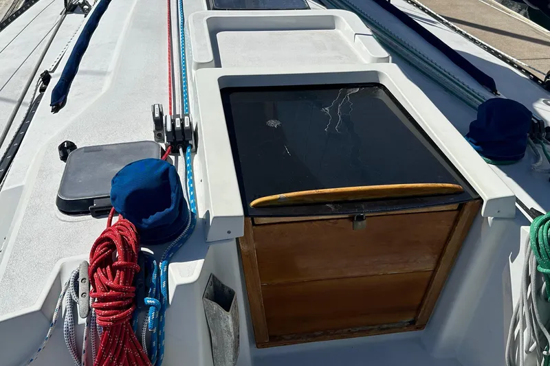 Slide: The Image of C&C 41 sailboat cockpit with ropes and wooden hatch, year 1985. - 9