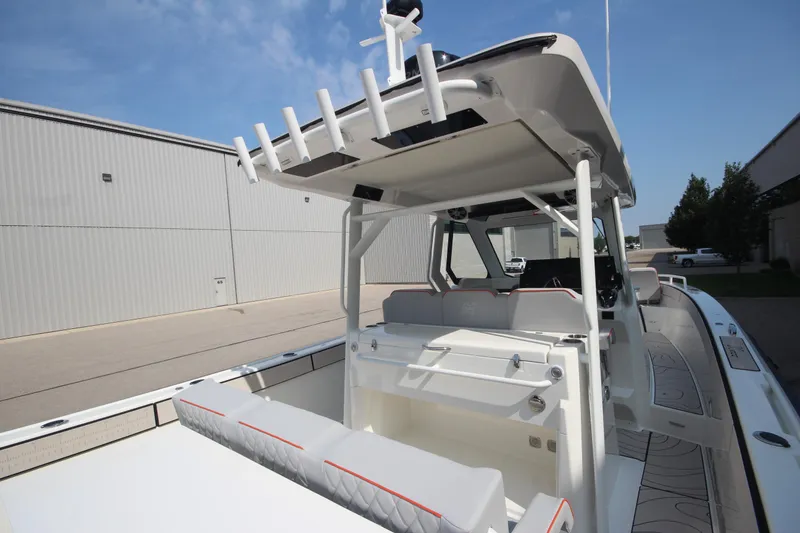 Slide: The Image of 2026 Zodiac X10CC boat with twin Yamaha engines, featuring joystick control, docked outdoors. - 12