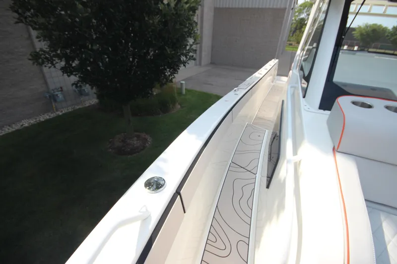 Slide: The Image of 2026 Zodiac X10CC boat deck with modern seating and sleek design. - 34