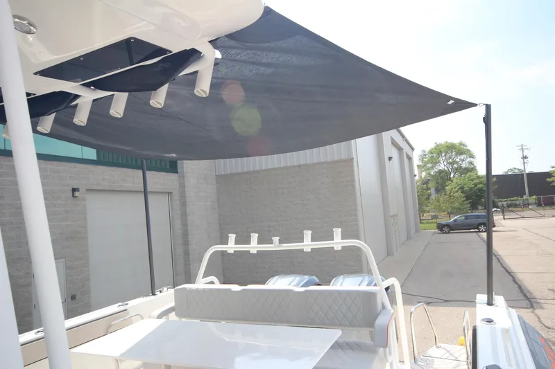 Slide: The Image of 2026 Zodiac X10CC boat with sunshade, twin Yamaha F350XSA engines, and joystick control. - 44