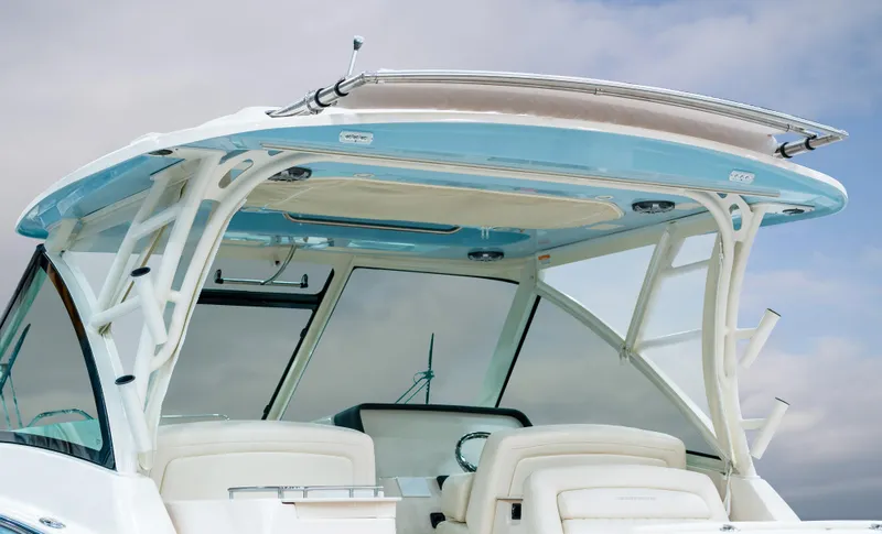 Slide: The Image of 2025 Grady-White Freedom 325 boat with sleek design and modern features. - 6