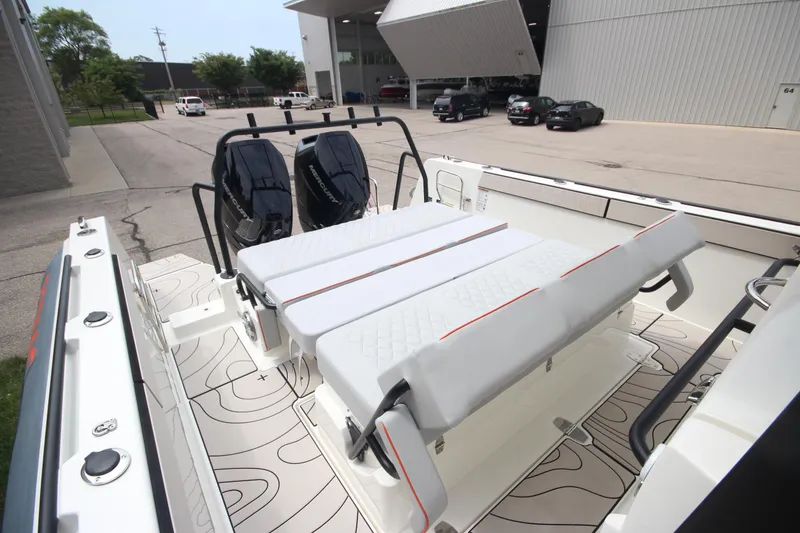 Slide: The Image of 2025 Zodiac X10CC boat with twin Mercury 400 engines, featuring joystick control and luxurious seating. - 13