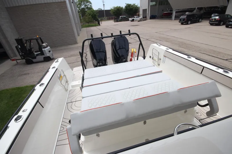 Slide: The Image of 2025 Zodiac X10CC boat with open storage compartment and stylish seating. - 14