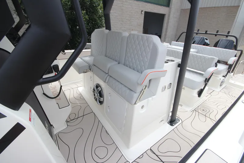 Slide: The Image of 2025 Zodiac X10CC boat interior with twin Mercury 400 engines and joystick control. - 18