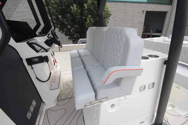 Slide: The Image of 2025 Zodiac X10CC boat with twin Mercury 400 engines, joystick control, and spacious seating. - 19