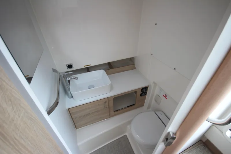 Slide: The Image of Interior cabin of 2025 Zodiac X10CC boat with modern design and comfortable seating. - 27