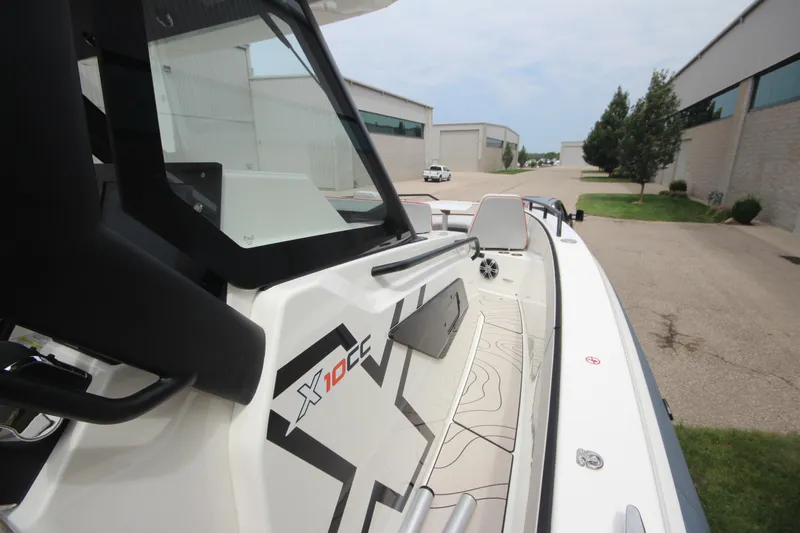 Slide: The Image of Interior cabin of 2025 Zodiac X10CC boat, featuring modern design and comfortable seating. - 28
