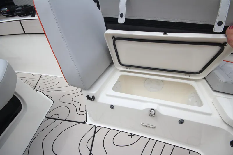 Slide: The Image of 2025 Zodiac X10CC boat with Twin Mercury 400 engines, docked near modern buildings. - 33