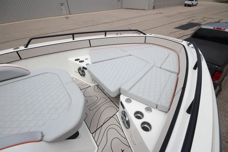 Slide: The Image of Open storage compartment on Zodiac X10CC boat, showcasing modern design and functionality. - 36