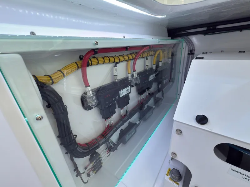 Slide: The Image of 2025 Mag Bay 38 Center Console electrical panel with organized wiring. - 35