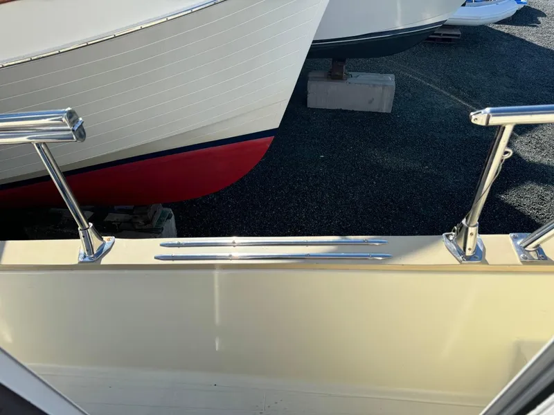 Slide: The Image of 1984 Tollycraft 48 Cockpit Motor Yacht deck with stainless steel railings. - 18