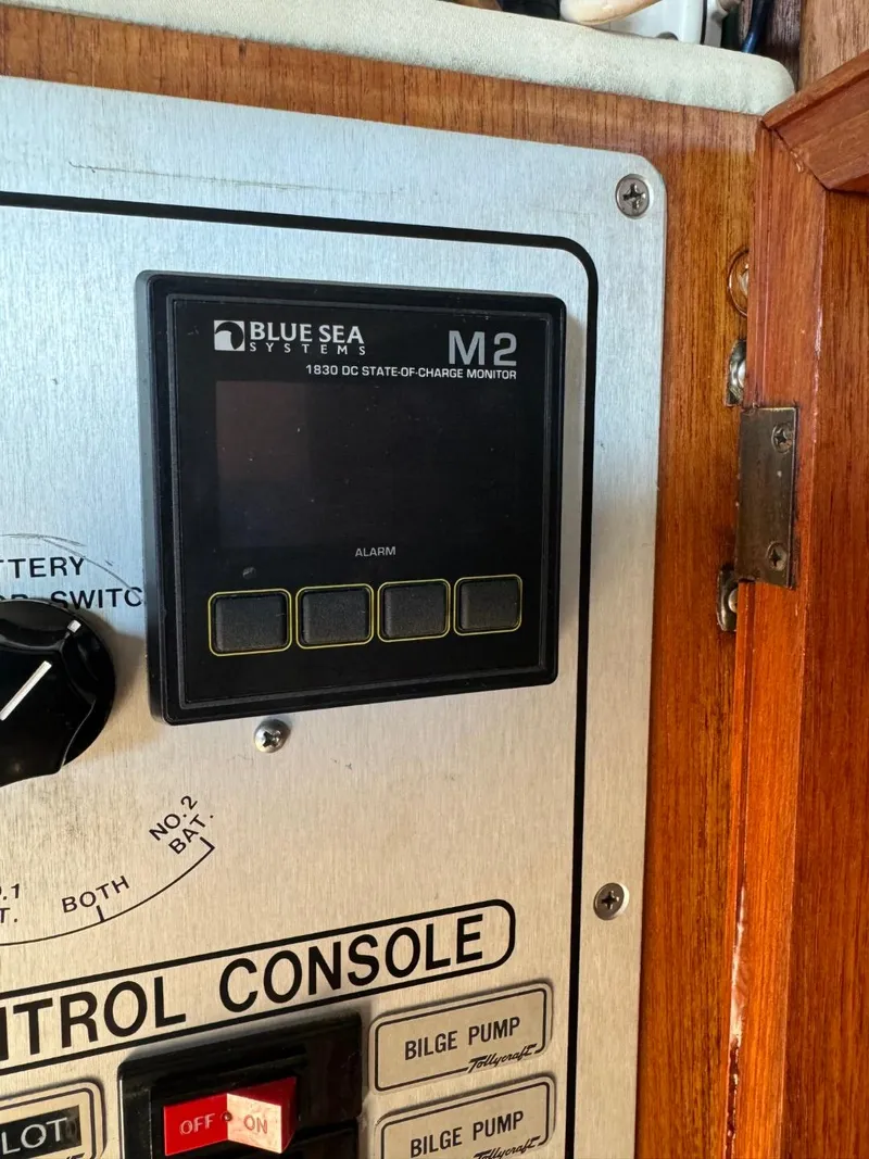 Slide: The Image of Control console of 1984 Tollycraft 48 Cockpit Motor Yacht with Blue Sea Systems M2 monitor. - 20