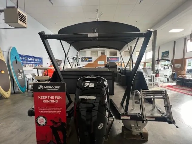 Slide: The Image of 2025 Viaggio Lago V 18 boat with Mercury 75 engine in showroom. - 5