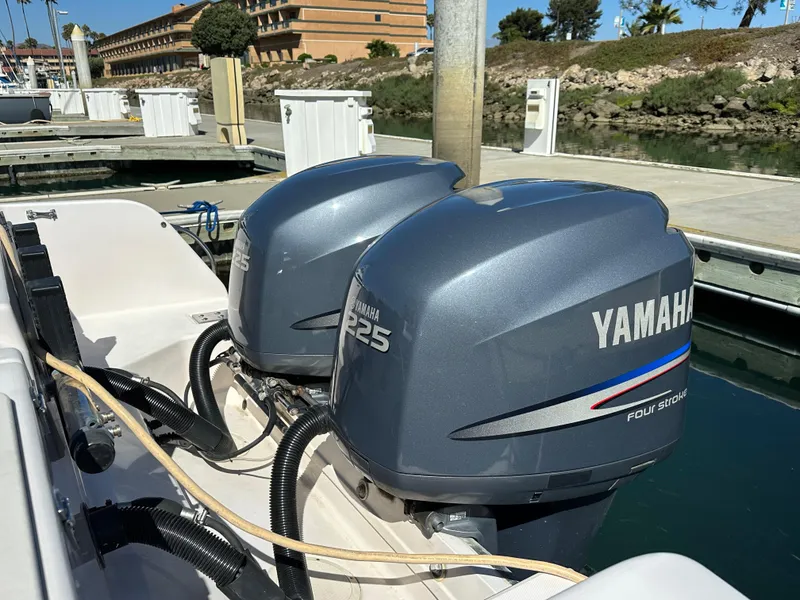 Slide: The Image of 2002 Grady-White 282 Sailfish with twin Yamaha 225 engines at marina dock. - 3