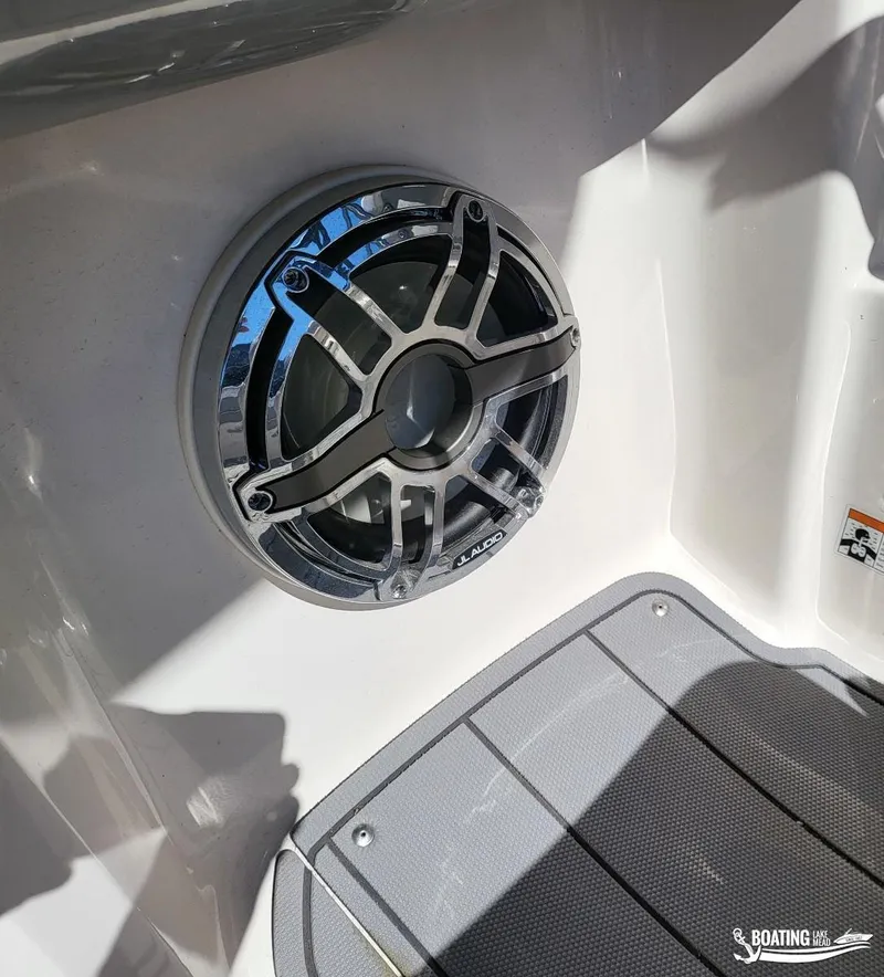 Slide: The Image of JL Audio speaker on 2021 Chaparral 23 Surf boat interior. - 12