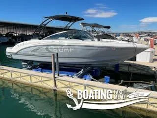 Slide: The Image of 2021 Chaparral 23 Surf boat docked at Lake Mead marina. - 21