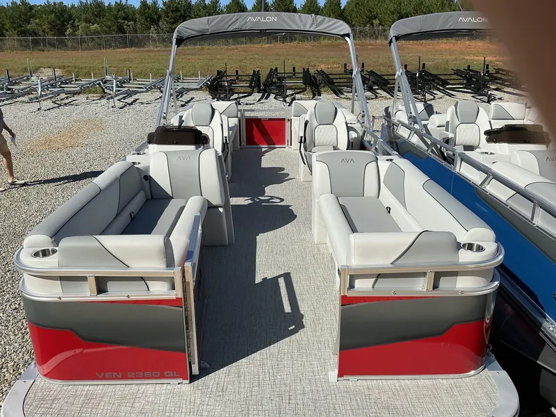 Slide: The Image of 2025 Avalon Venture 23 FT Quad Lounger pontoon boat with spacious seating and modern design. - 3