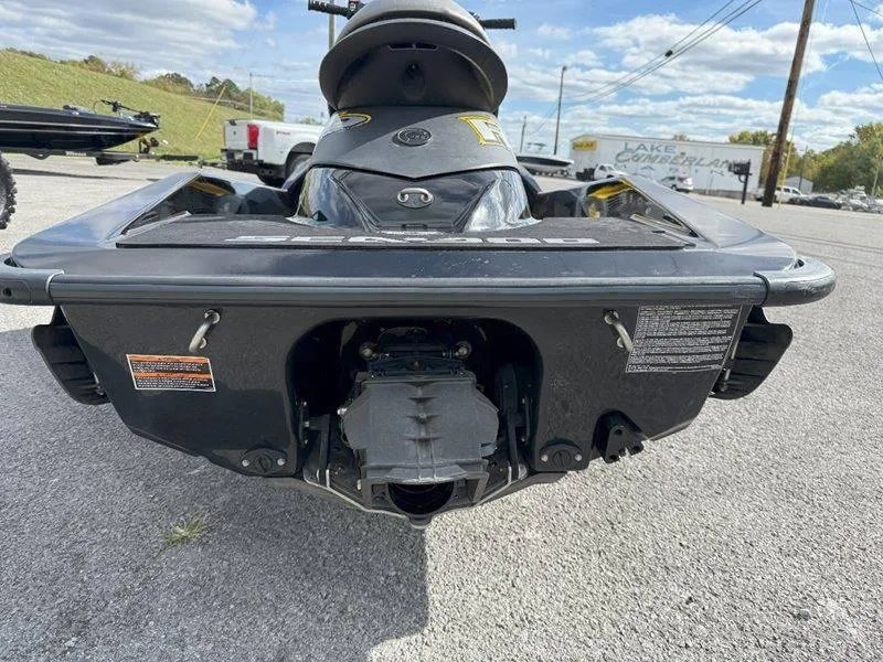Slide: The Image of 2007 Sea-Doo RXP 215 jet ski rear view on pavement. - 17
