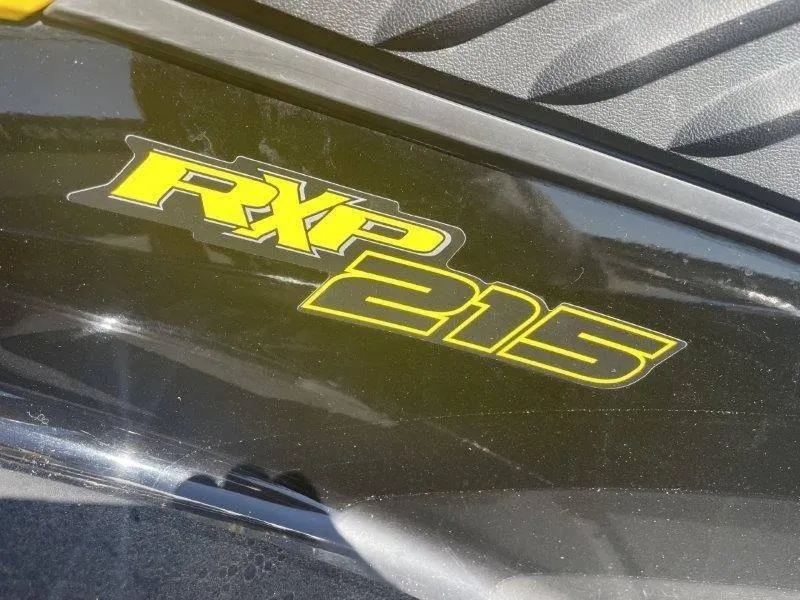 Slide: The Image of Close-up of 2007 Sea-Doo RXP 215 logo on black surface. - 20