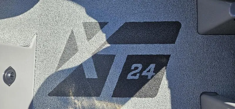 Slide: The Image of MasterCraft XT24 2025 boat flooring with logo design. - 10