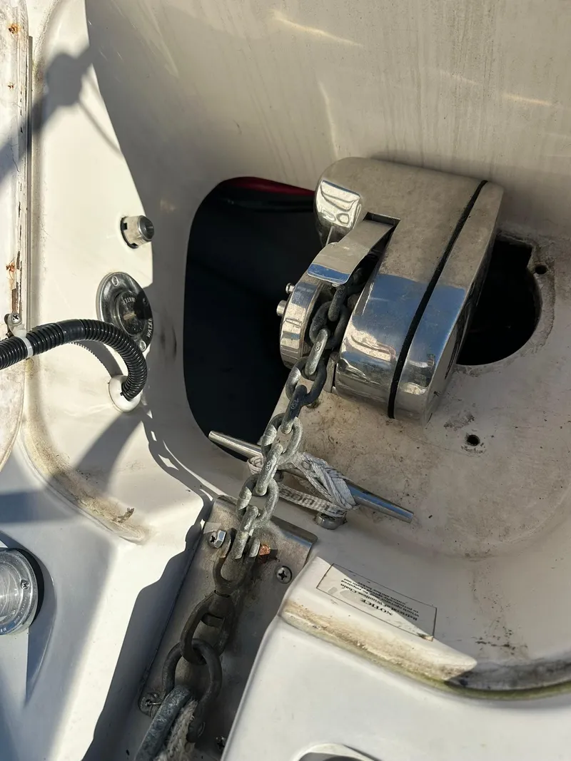 Slide: The Image of Anchor chain mechanism on 1997 Regal 292 Commodore boat. - 27
