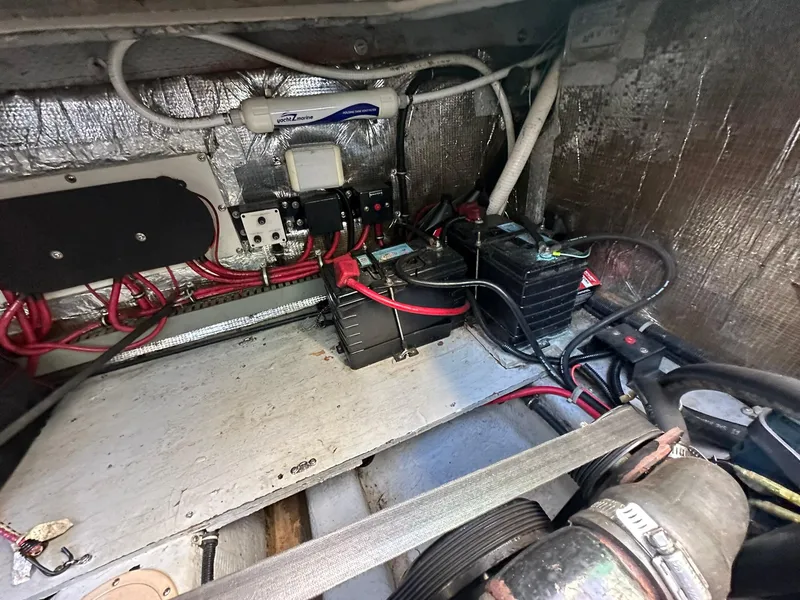 Slide: The Image of Engine compartment of a 1997 Regal 292 Commodore boat with wiring and components. - 29