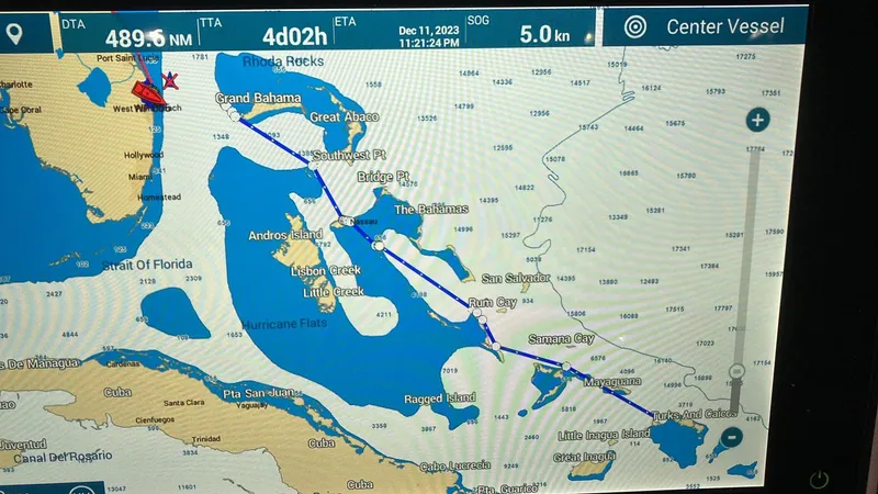 Slide: The Image of Nautical map showing Millennium Marine NuWave Walkaround route near the Bahamas, December 2023. - 25