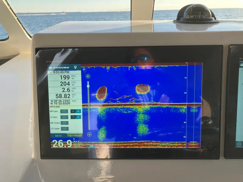 Slide: The Image of Fish finder display on 2023 Millennium Marine NuWave Walkaround boat. - 33