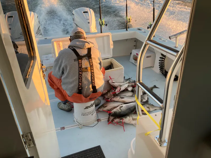 Slide: The Image of Man on 2023 Millennium Marine NuWave Walkaround with fresh catch on deck. - 34