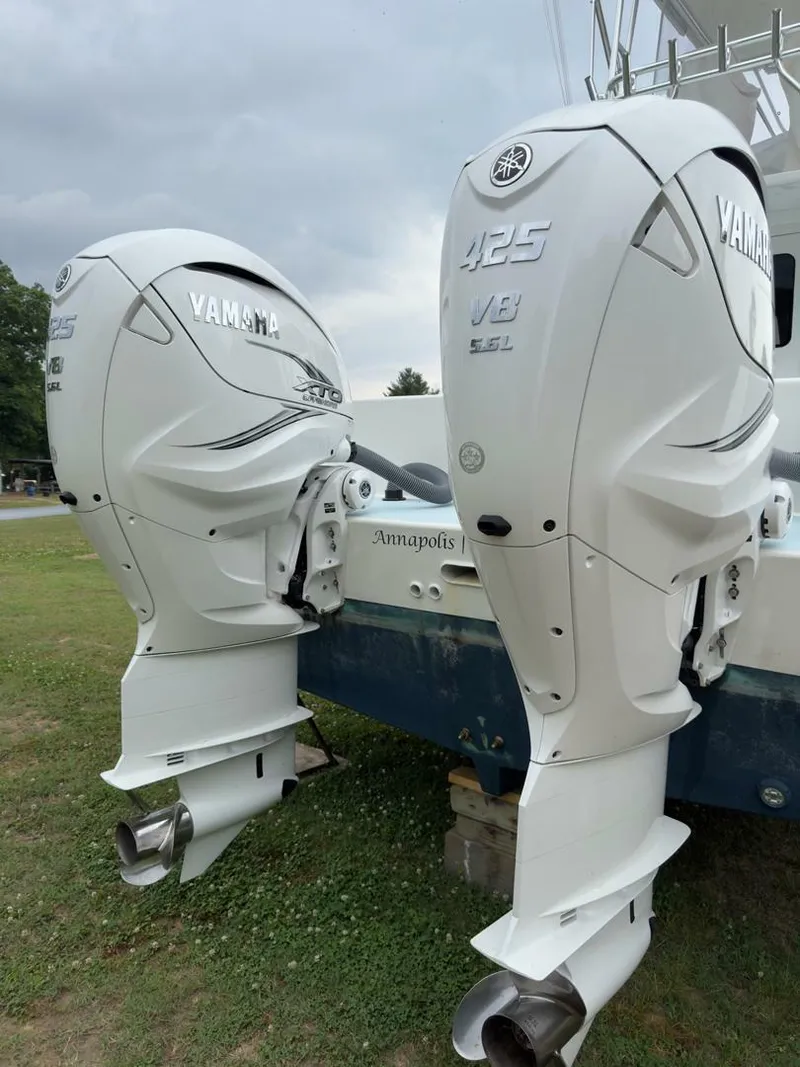 Slide: The Image of 2023 Millennium Marine NuWave Walkaround with twin Yamaha 425 V8 outboard engines. - 5