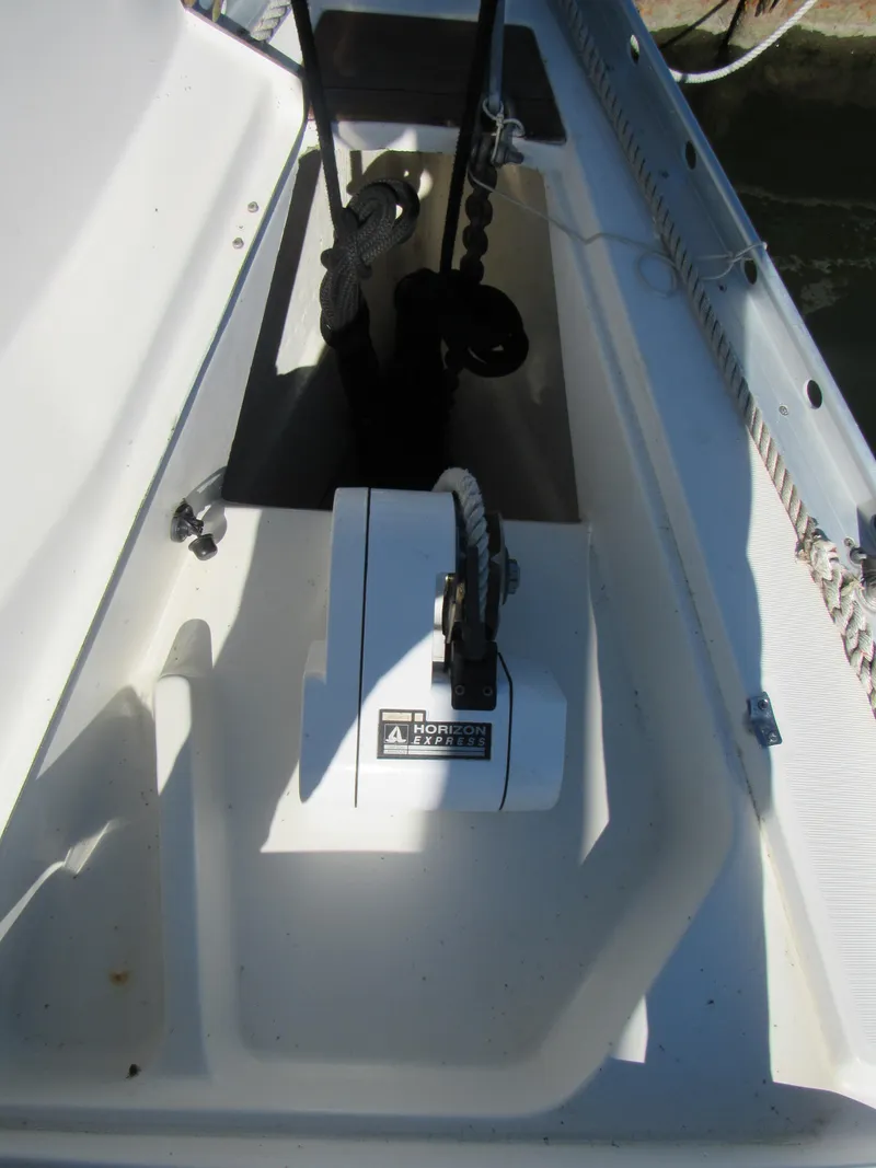 Slide: The Image of 1999 Beneteau 381 sailboat deck with anchor windlass system. - 23