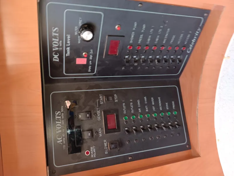 Slide: The Image of Electrical control panel on a 2001 Celebrity 280 Express Cruiser boat. - 12