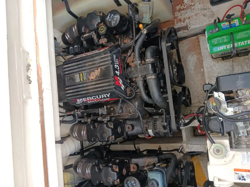 Slide: The Image of Engine compartment of a 2001 Celebrity 280 Express Cruiser with Mercury 4.3L motor. - 25