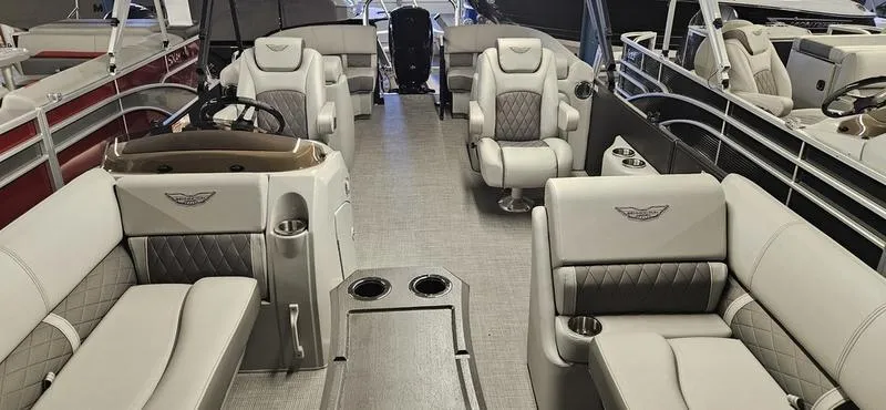 Slide: The Image of 2025 Bennington 23LSR pontoon boat interior with luxurious seating and modern design. - 3