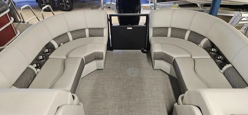 Slide: The Image of 2025 Bennington 23LSR boat interior with spacious seating and modern design. - 4