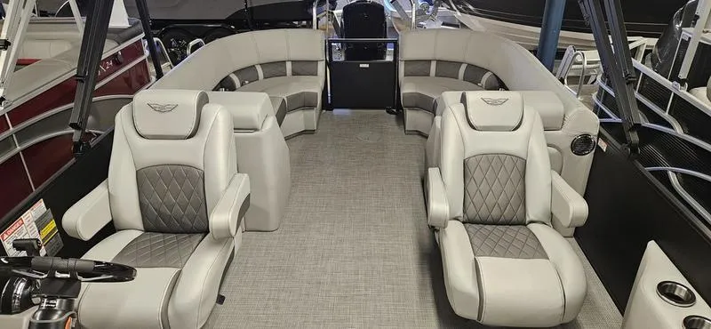 Slide: The Image of 2025 Bennington 23LSR pontoon boat interior with luxurious seating and modern design. - 7