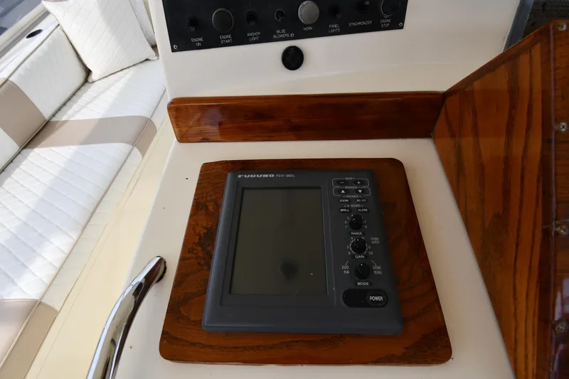 Slide: The Image of Control panel on 1990 Viking 53 Convertible yacht with navigation equipment. - 31