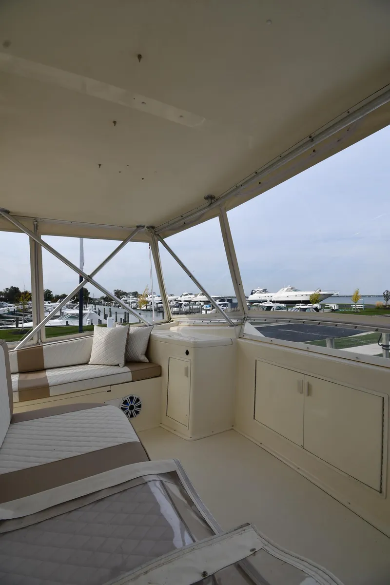 Slide: The Image of Interior view of 1990 Viking 53 Convertible yacht with seating and storage. - 41