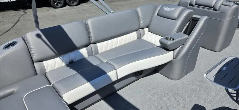 Slide: The Image of 2025 Bennington 23 RSB boat interior with gray and white seating. - 14