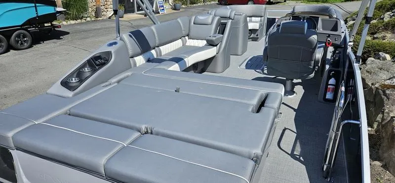 Slide: The Image of 2025 Bennington 23 RSB pontoon boat with spacious seating and modern design. - 6
