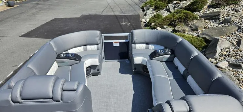 Slide: The Image of 2025 Bennington 23 RSB pontoon boat interior with gray seating and cup holders. - 8