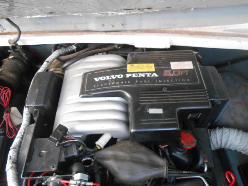 Slide: The Image of Volvo Penta 5.0 Fi engine in a 1995 Larson 280 Cabrio boat. - 23