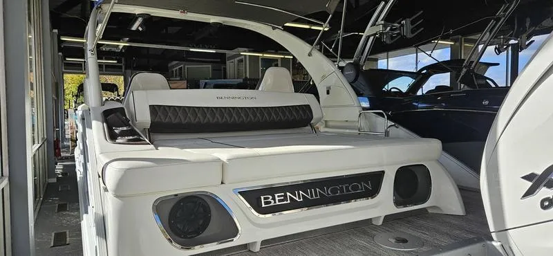 Slide: The Image of 2025 Bennington R 25 RSBA luxury boat interior with sleek seating and modern design. - 10