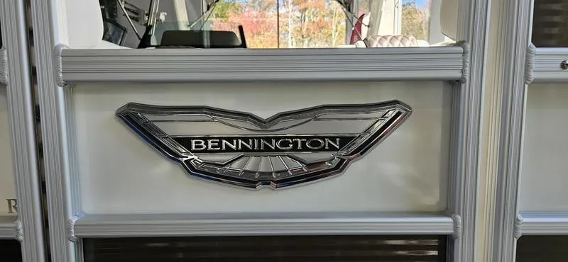 Slide: The Image of 2025 Bennington R 25 RSBA logo on boat exterior. - 13