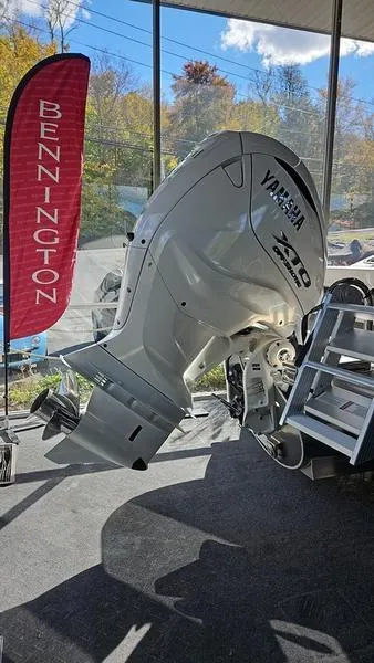 Slide: The Image of 2025 Bennington R 25 RSBA with Yamaha outboard motor display. - 15