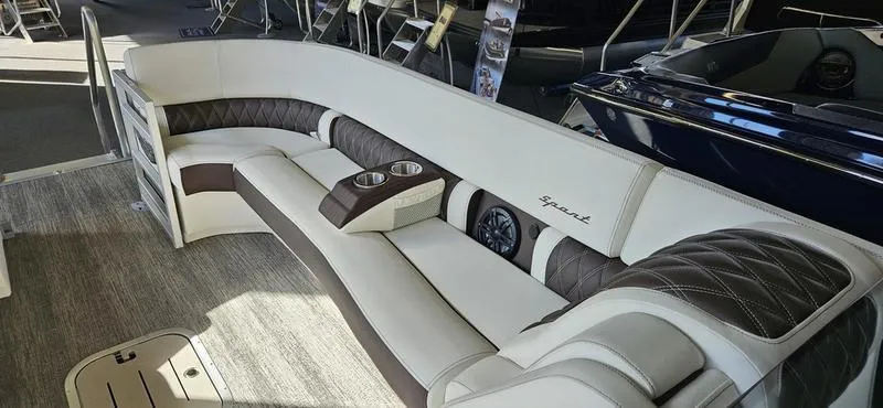 Slide: The Image of Luxurious seating on 2025 Bennington R 25 RSBA pontoon boat, featuring elegant upholstery. - 5