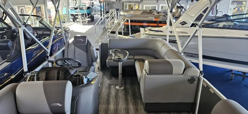 Slide: The Image of 2025 Bennington 168 SL pontoon boat interior with gray seating and modern design. - 5