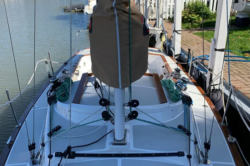 Slide: The Image of 2022 Tartan Fantail sailboat docked, showcasing deck and rigging details. - 23