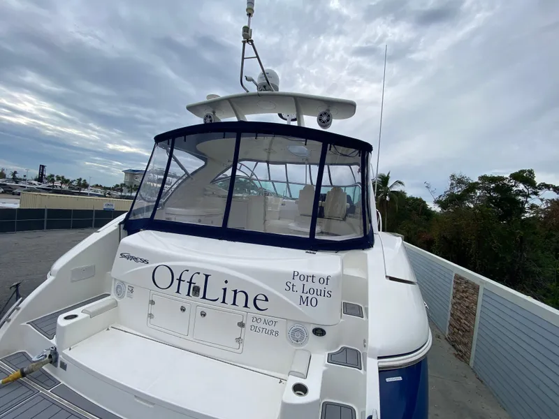 Slide: The Image of 2006 Cruisers Yachts 52 Express at dock, named "OffLine," Port of St. Louis, MO. - 101