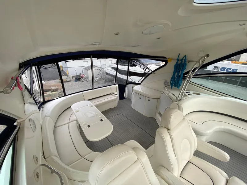 Slide: The Image of Luxurious 2006 Cruisers Yachts 52 Express interior with elegant seating and modern design. - 20